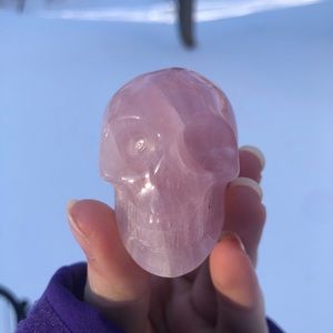 Rose quartz crystal skull carving